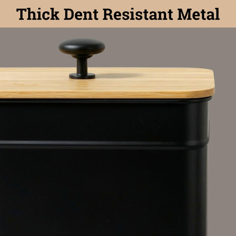 HB Design Co. metal handle and bamboo lid lifted, demonstrates comfortable opening without spills