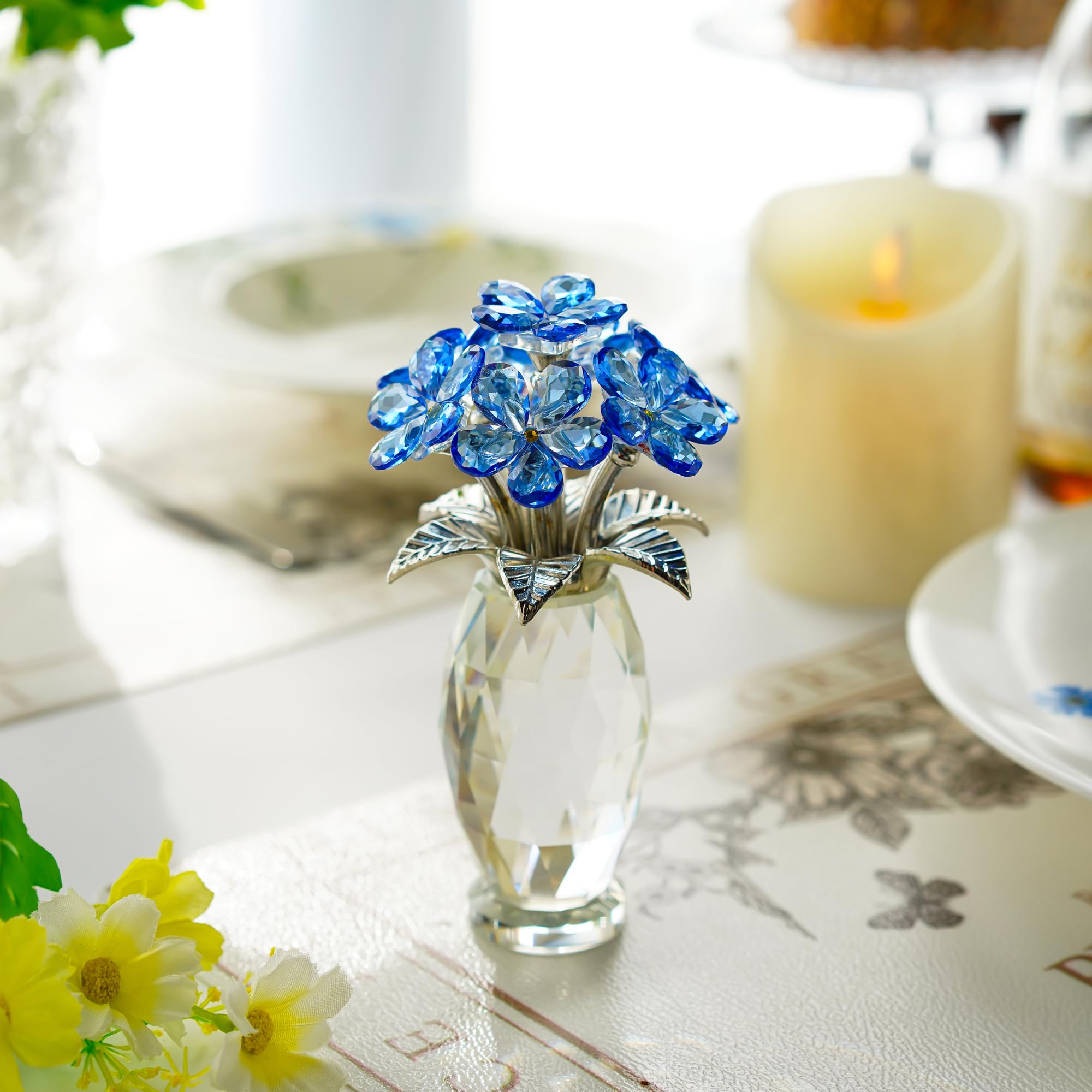 H&D HYALINE & DORA displayed in a glass cabinet emphasizing reflective sparkle and collection appeal