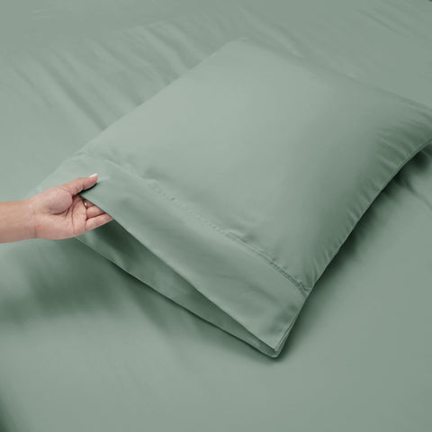 Hearth & Harbor measuring tape beside fitted sheet showing 18–24 inch fit