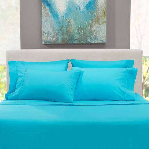 Hearth & Harbor bedroom lifestyle with made bed showing hotel-style look and ease