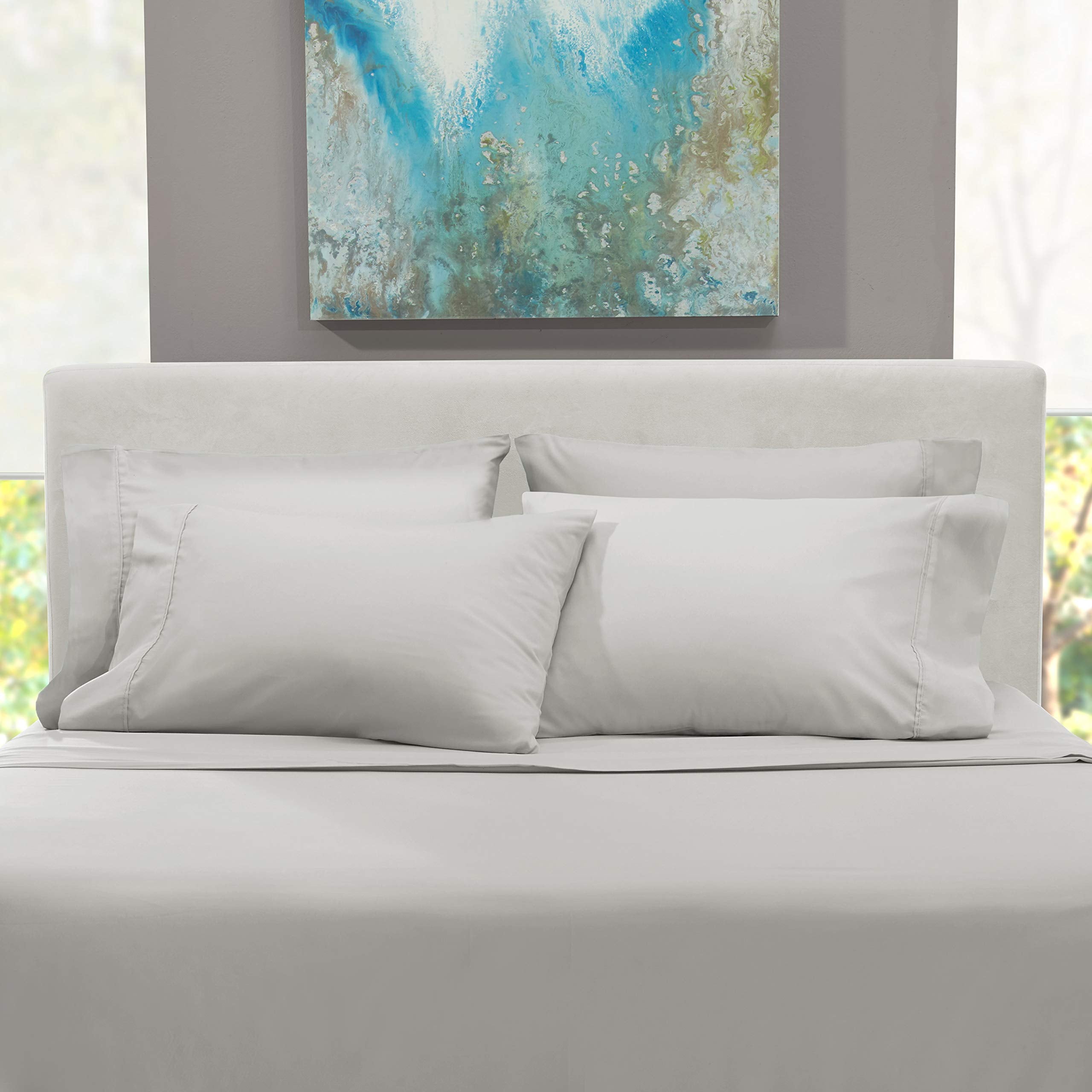 Hearth & Harbor bedroom lifestyle styling showing polished bed and cozy look