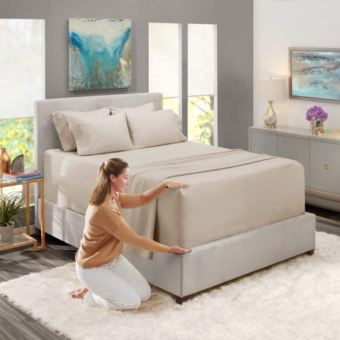 Hearth & Harbor flat sheet spread on bed showing generous drape benefit