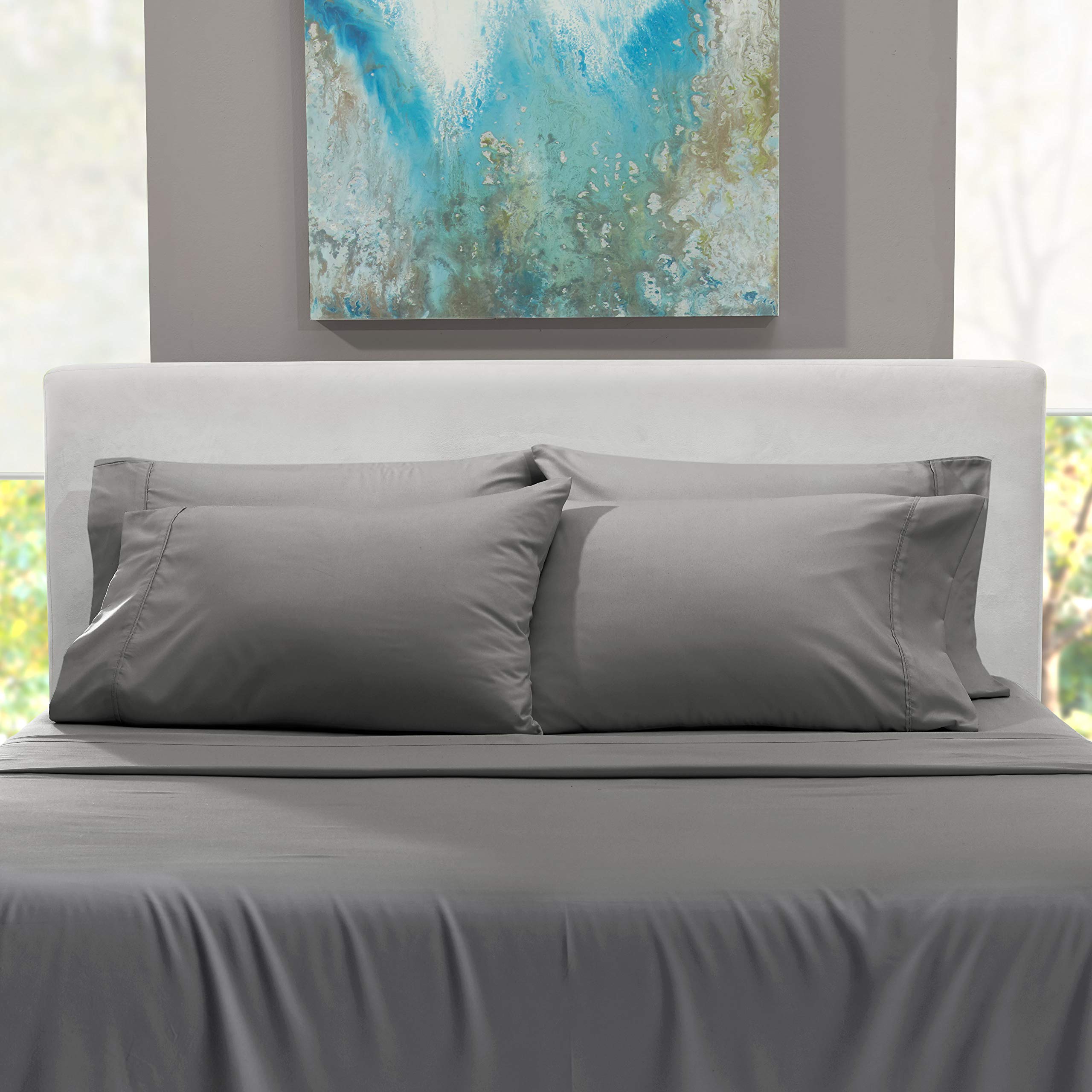 Hearth & Harbor styled bedroom with gray sheets showing neutral, modern look