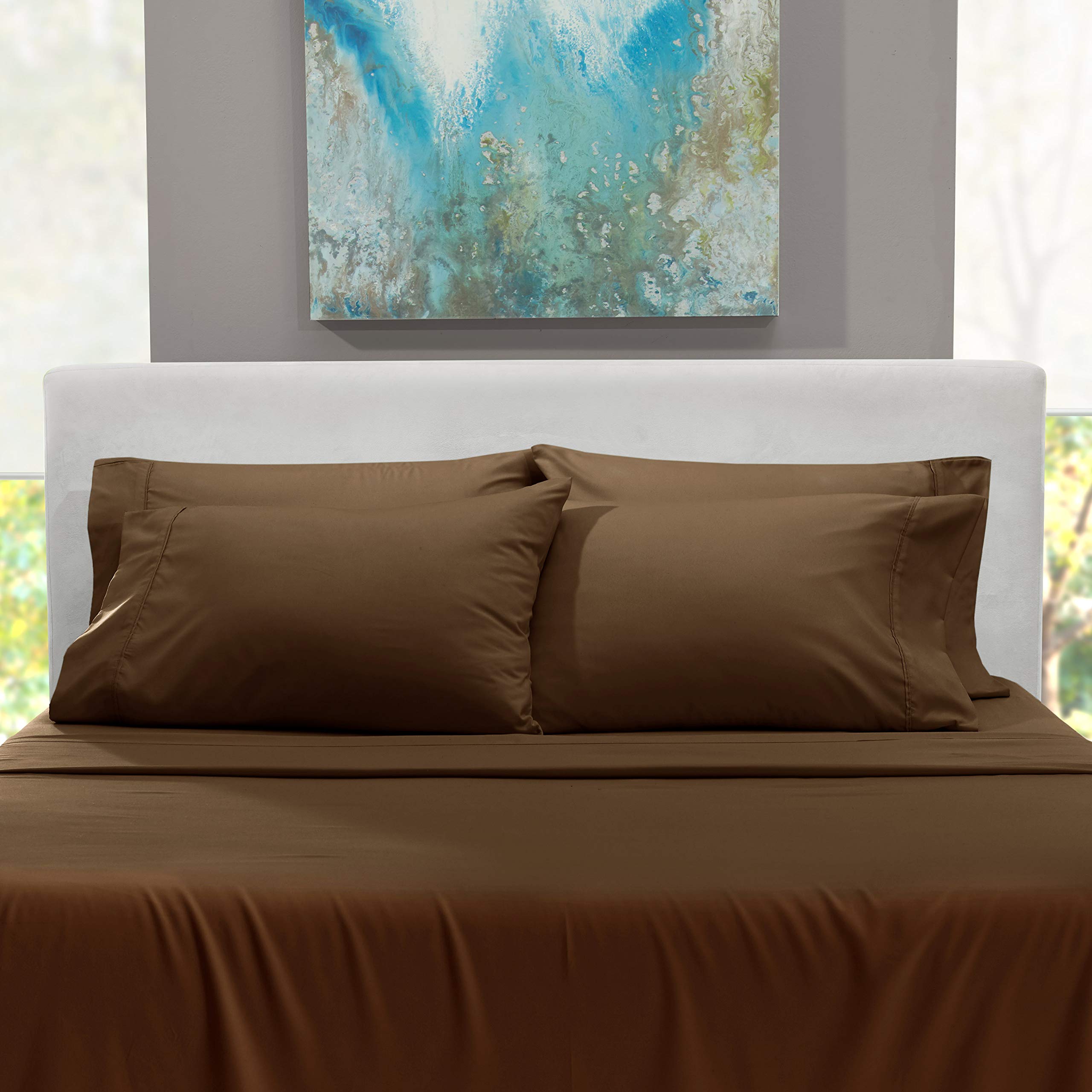 Hearth & Harbor fitted sheet shown against mattress to show scale
