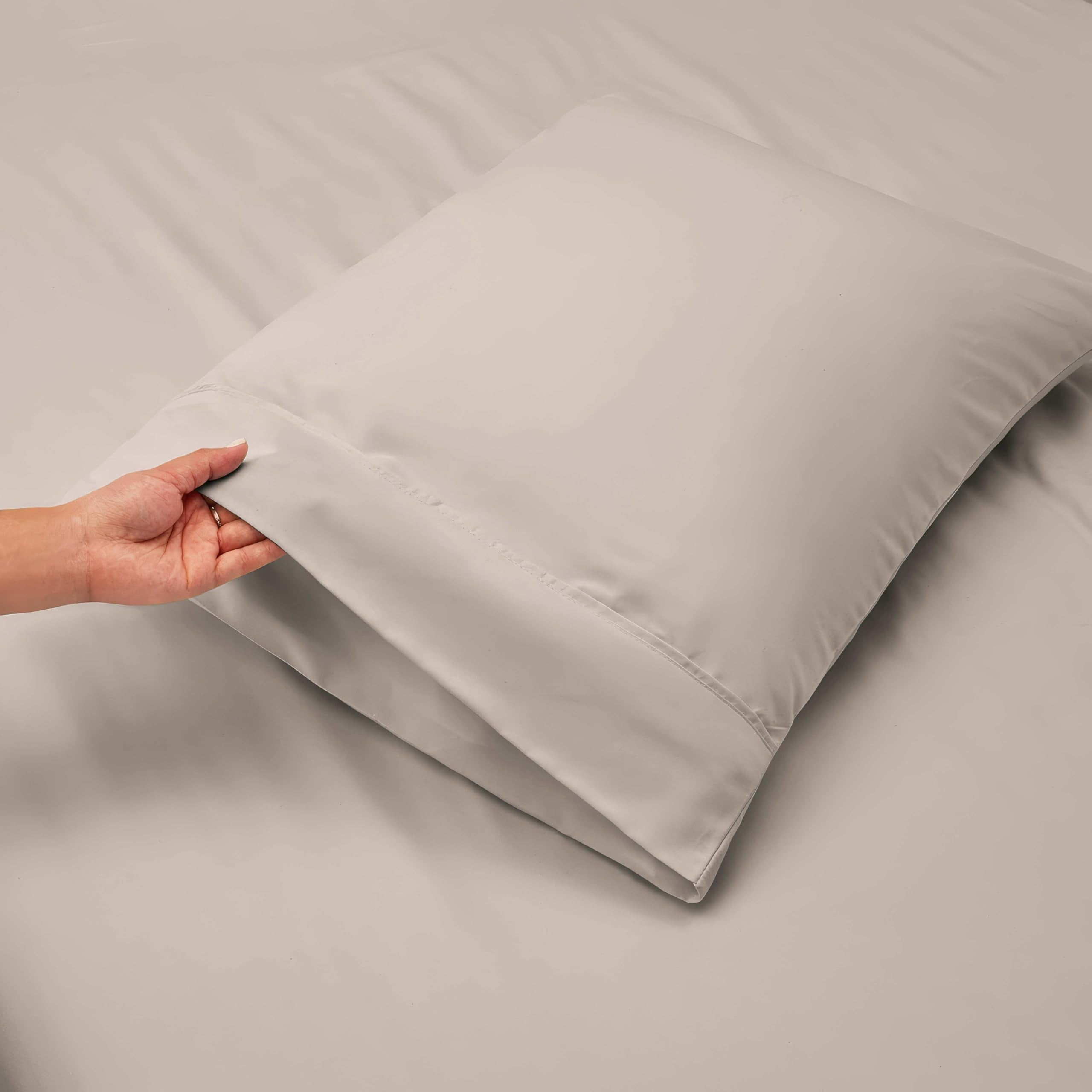 Hearth & Harbor sheet stretched on a 21-inch mattress showing true deep-pocket fit benefit