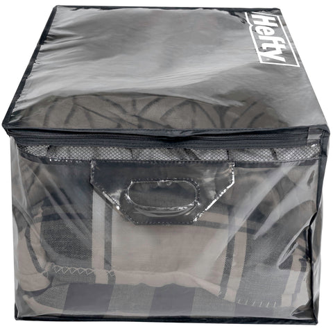Hefty carrying in use with person transporting bag showing portability benefit