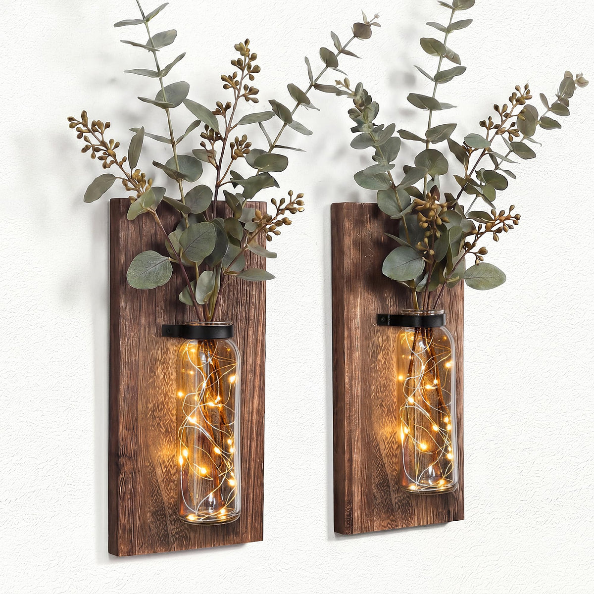 Heiple front view of two wall sconces showing rustic aesthetic and cozy lighting benefit