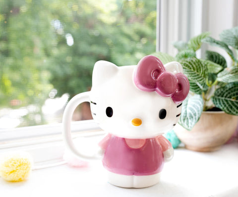 Silver Buffalo Hello Kitty mug in use with coffee for cheerful mornings