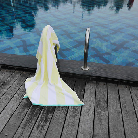 HENBAY towel draped on a pool chaise demonstrating large coverage and comfort