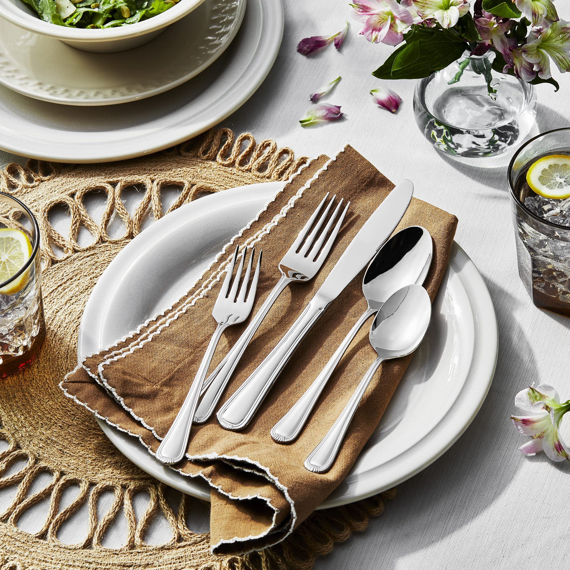 HENCKELS serving pieces arranged to show versatility for hosting benefit
