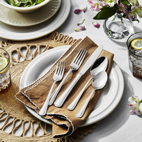 HENCKELS serving pieces arranged to show versatility for hosting benefit