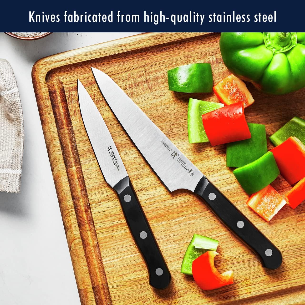 HENCKELS hardwood block with knives arranged for organized countertop convenience