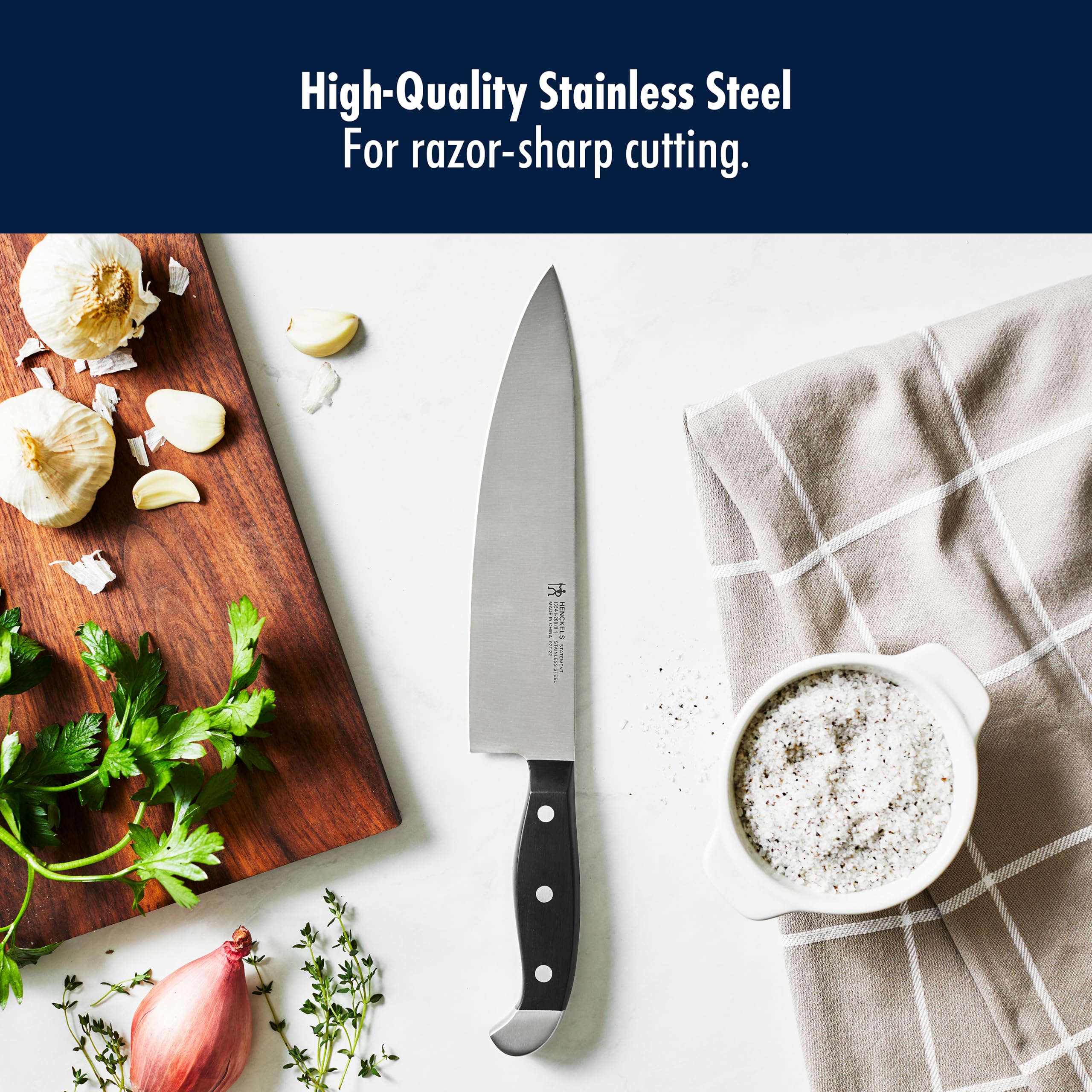 Henckels bread knife slicing a sourdough loaf for clean, even cuts