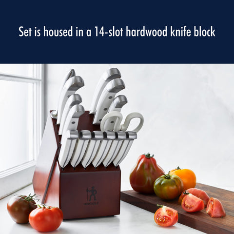 HENCKELS 8-inch chef's knife cutting vegetables for fast, precise prep