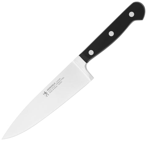 HENCKELS knife resting on cutting board in kitchen offering everyday reliability
