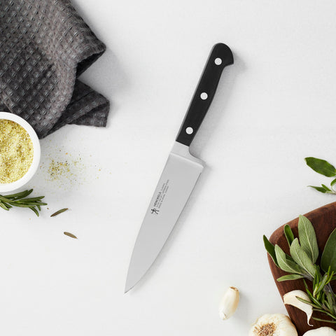 HENCKELS 6-inch blade beside ruler showing compact size for improved control