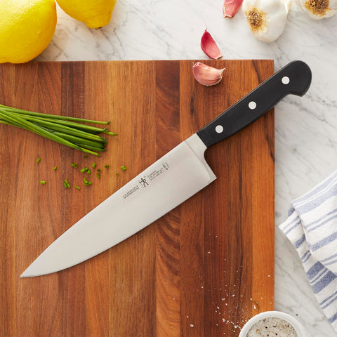 HENCKELS Classic blade close-up showing satin finish and sharp edge for precise slicing