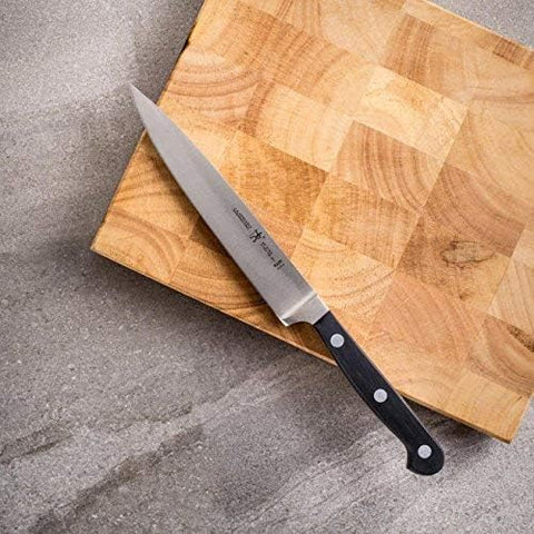 HENCKELS Classic handle close-up highlighting triple-rivet polypropylene grip for secure, durable handling benefit