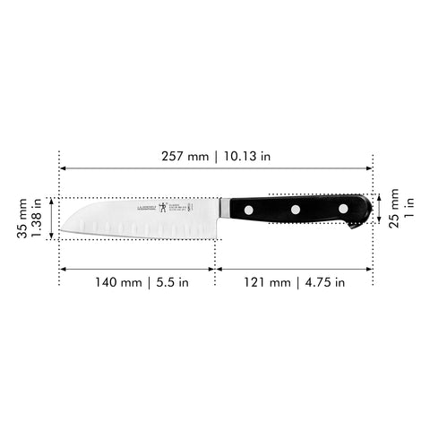 HENCKELS Classic Santoku in use mincing garlic quickly for efficient meal prep