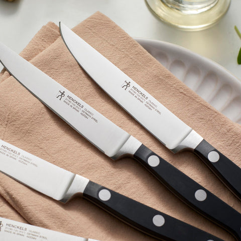 HENCKELS knives beside ruler for size and scale reference showing convenient table use