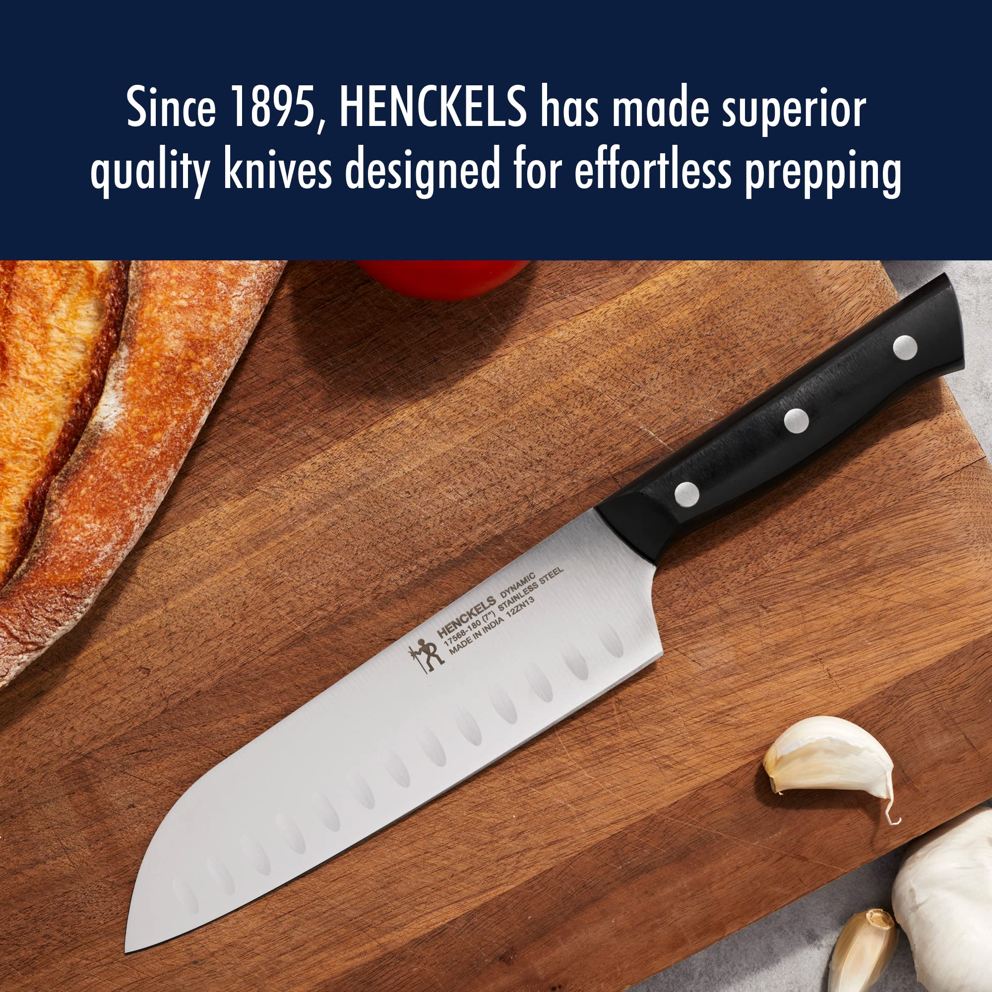 HENCKELS knife chopping vegetables in use showing effortless cutting
