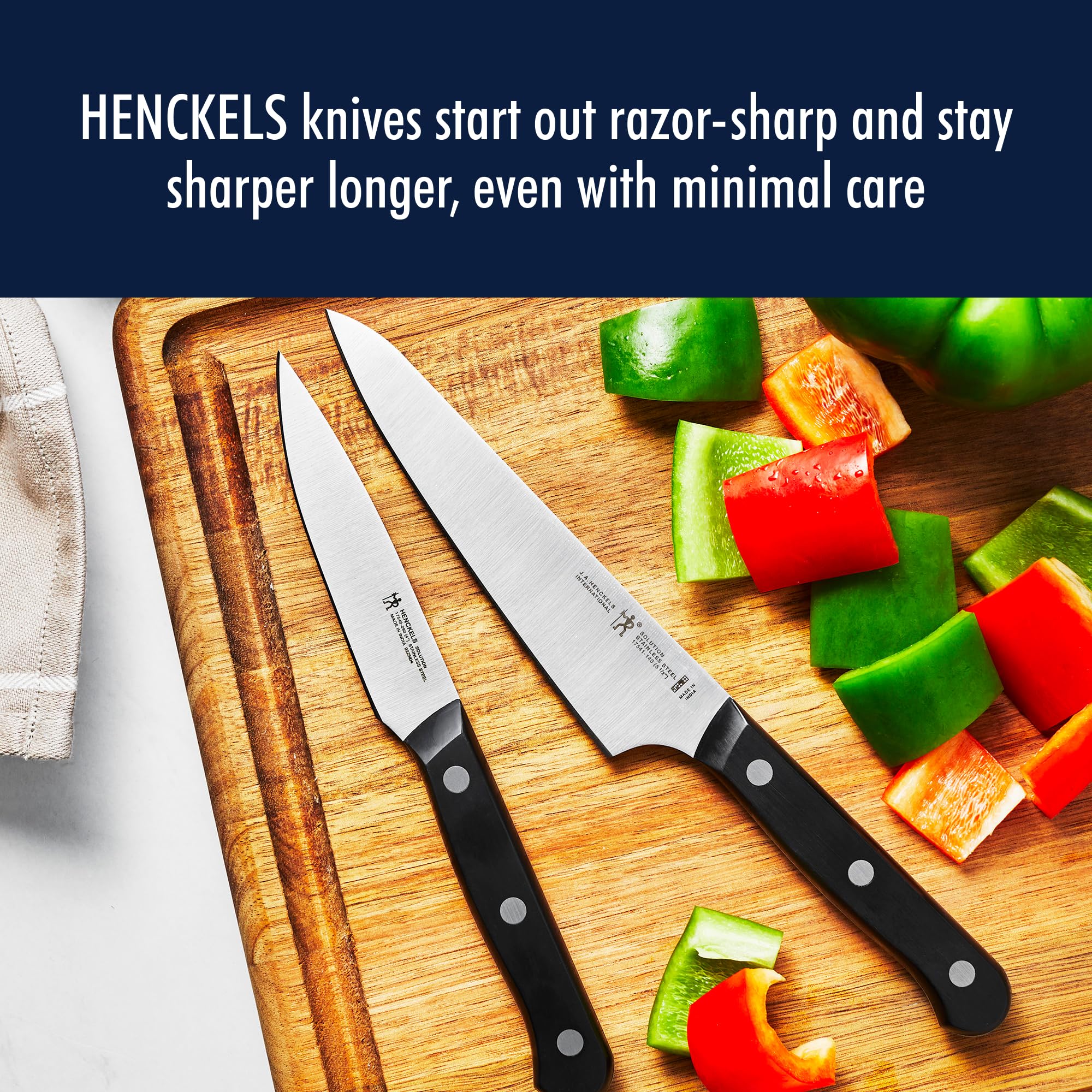 HENCKELS kitchen shears cutting herbs to show versatile prep and durable construction