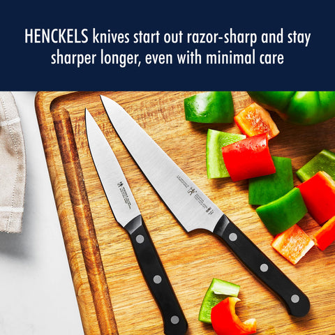 HENCKELS kitchen shears cutting herbs to show versatile prep and durable construction