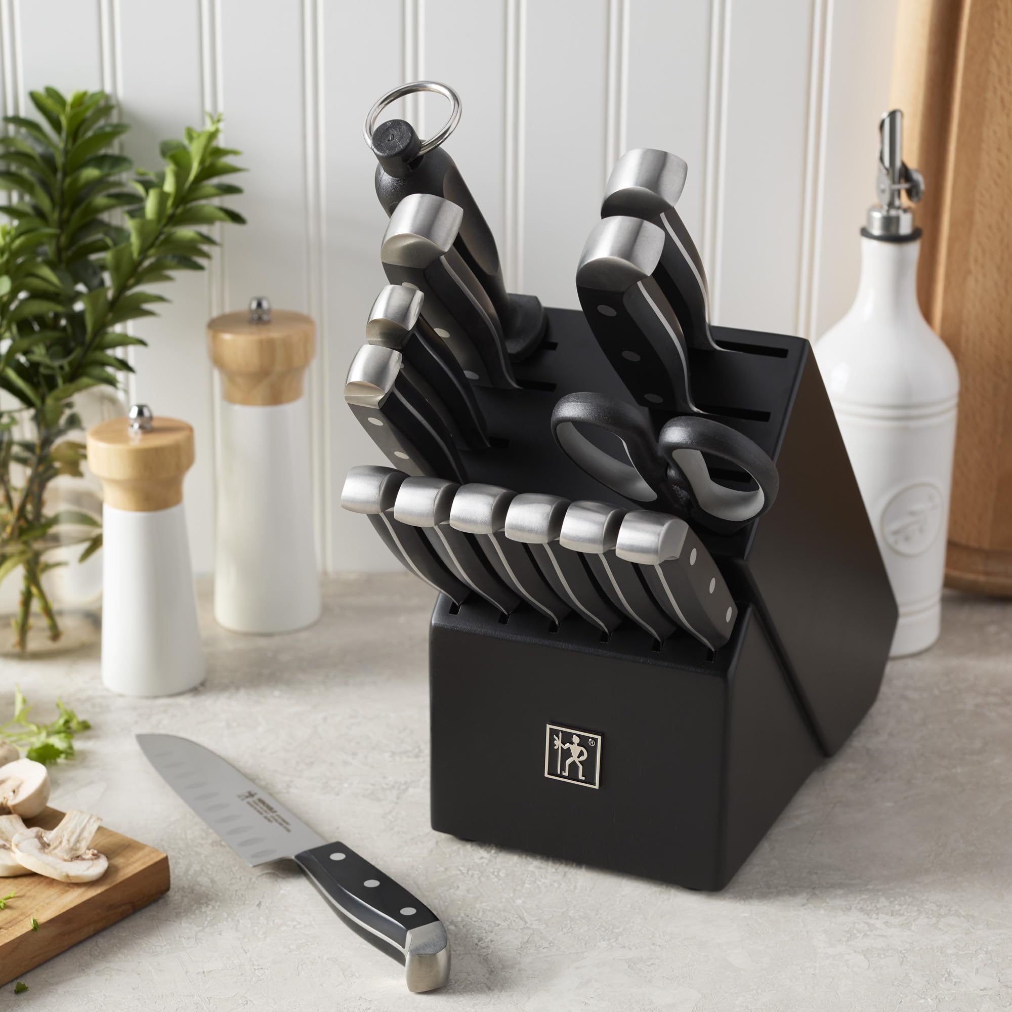 HENCKELS knives cutting vegetables on a chopping board to speed up meal prep
