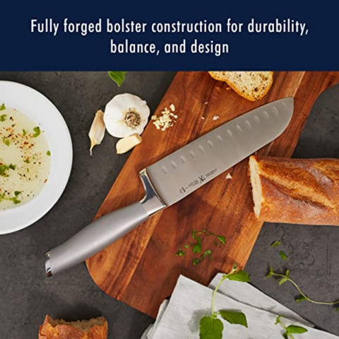 HENCKELS Modernist chef's knife slicing vegetables for efficient prep