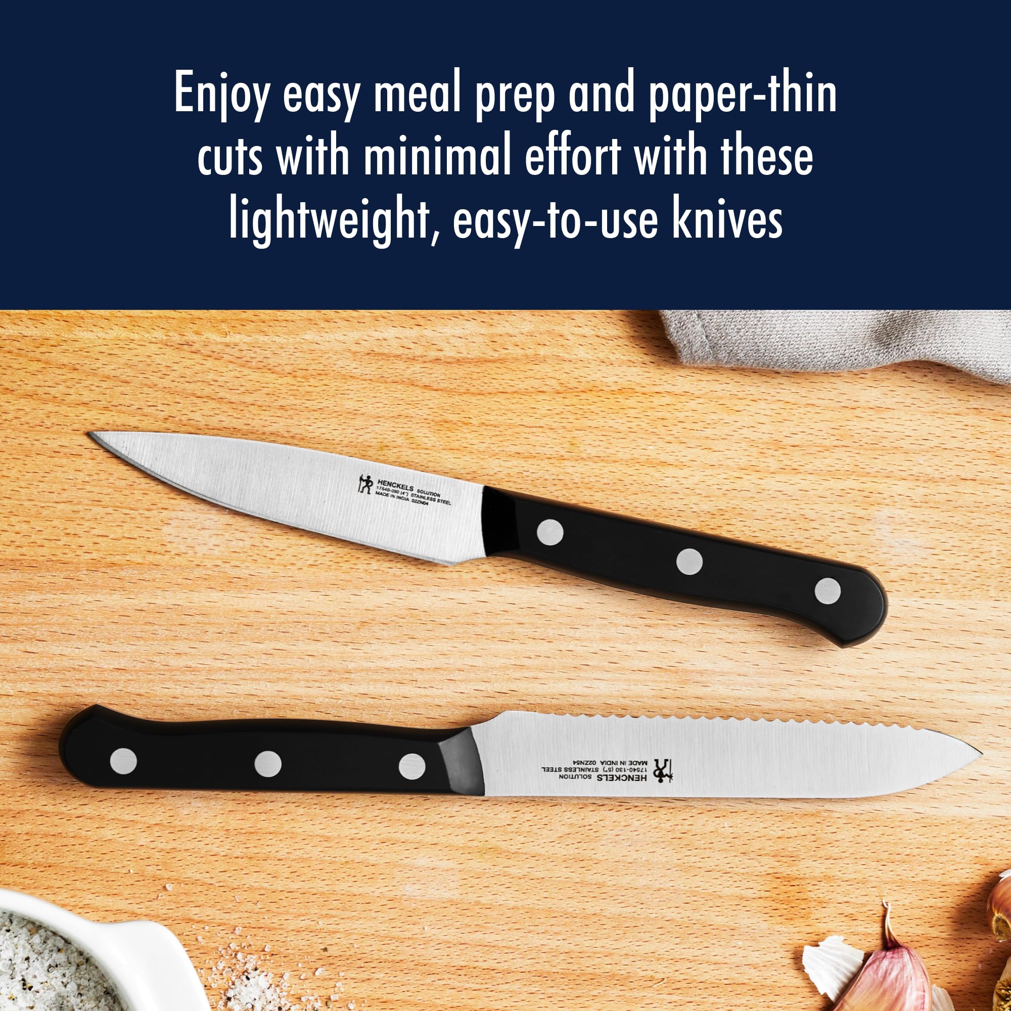 HENCKELS paring knife close detail showing tip control for peeling and trimming tasks