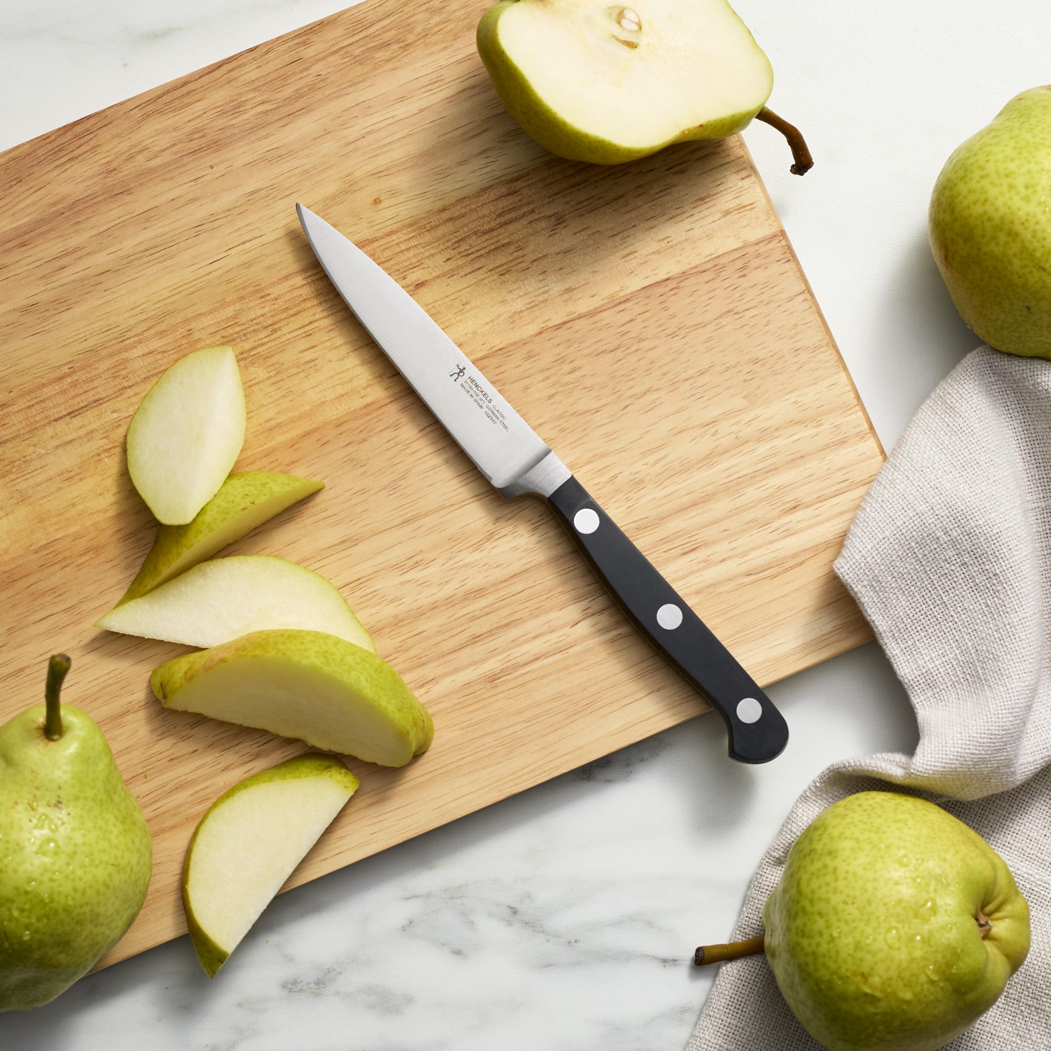 HENCKELS paring in kitchen lifestyle setting showing everyday usefulness