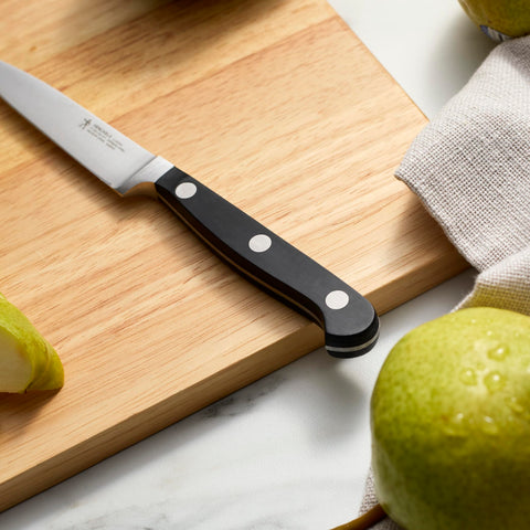 HENCKELS paring on cutting board showing blade angle and stability