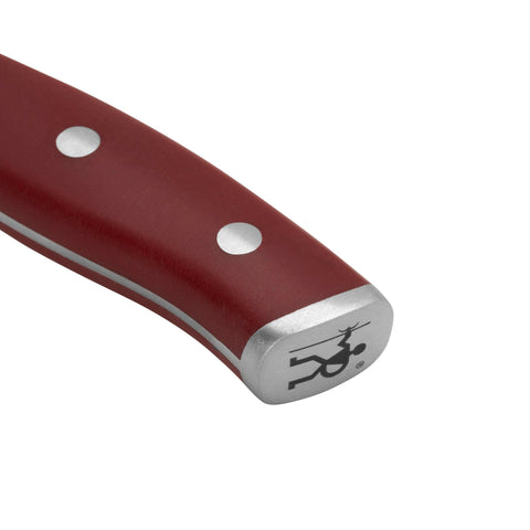 HENCKELS knife next to ruler conveying 5.5-inch blade length and scale clarity