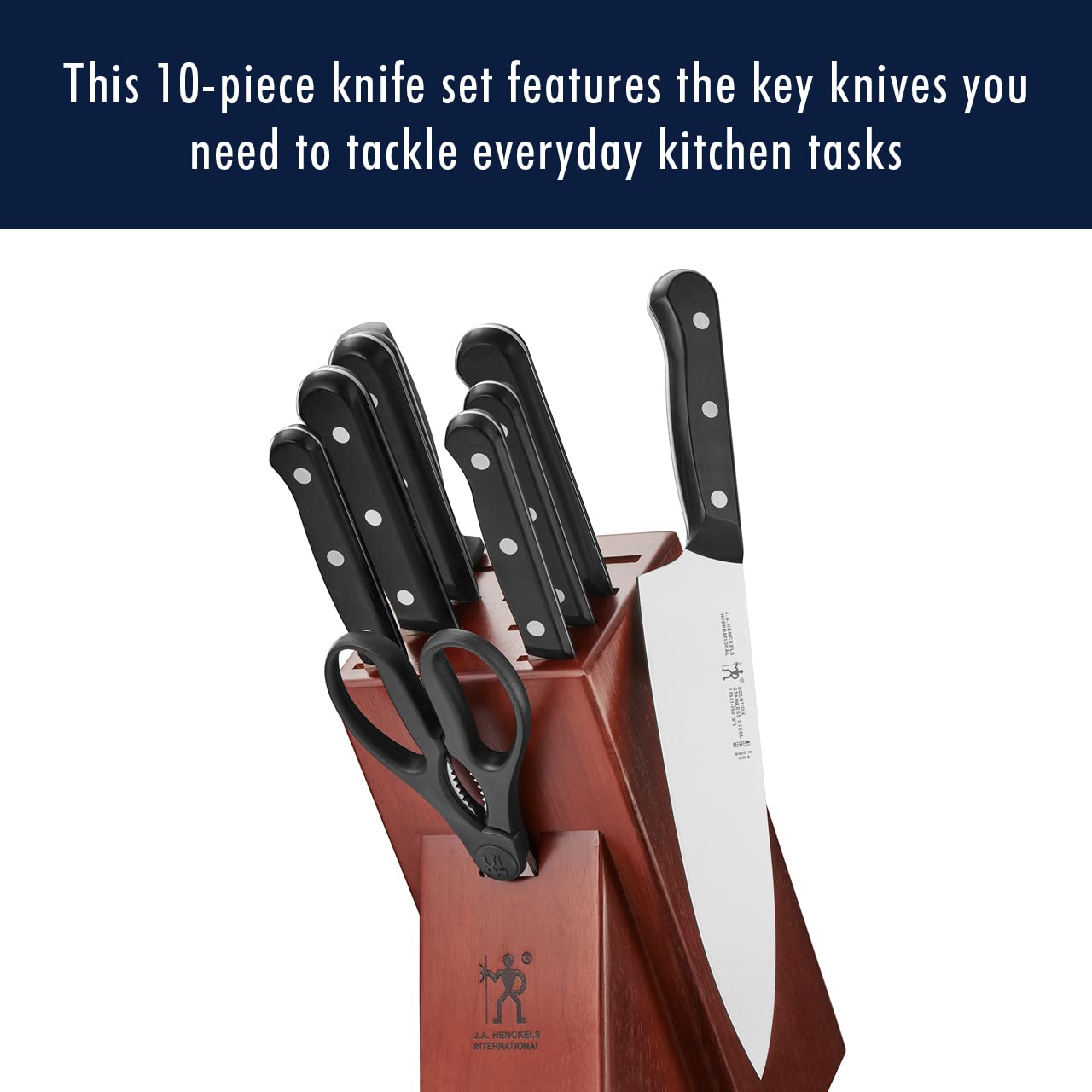 HENCKELS solution chef knife close-up showing razor-sharp edge for precision
