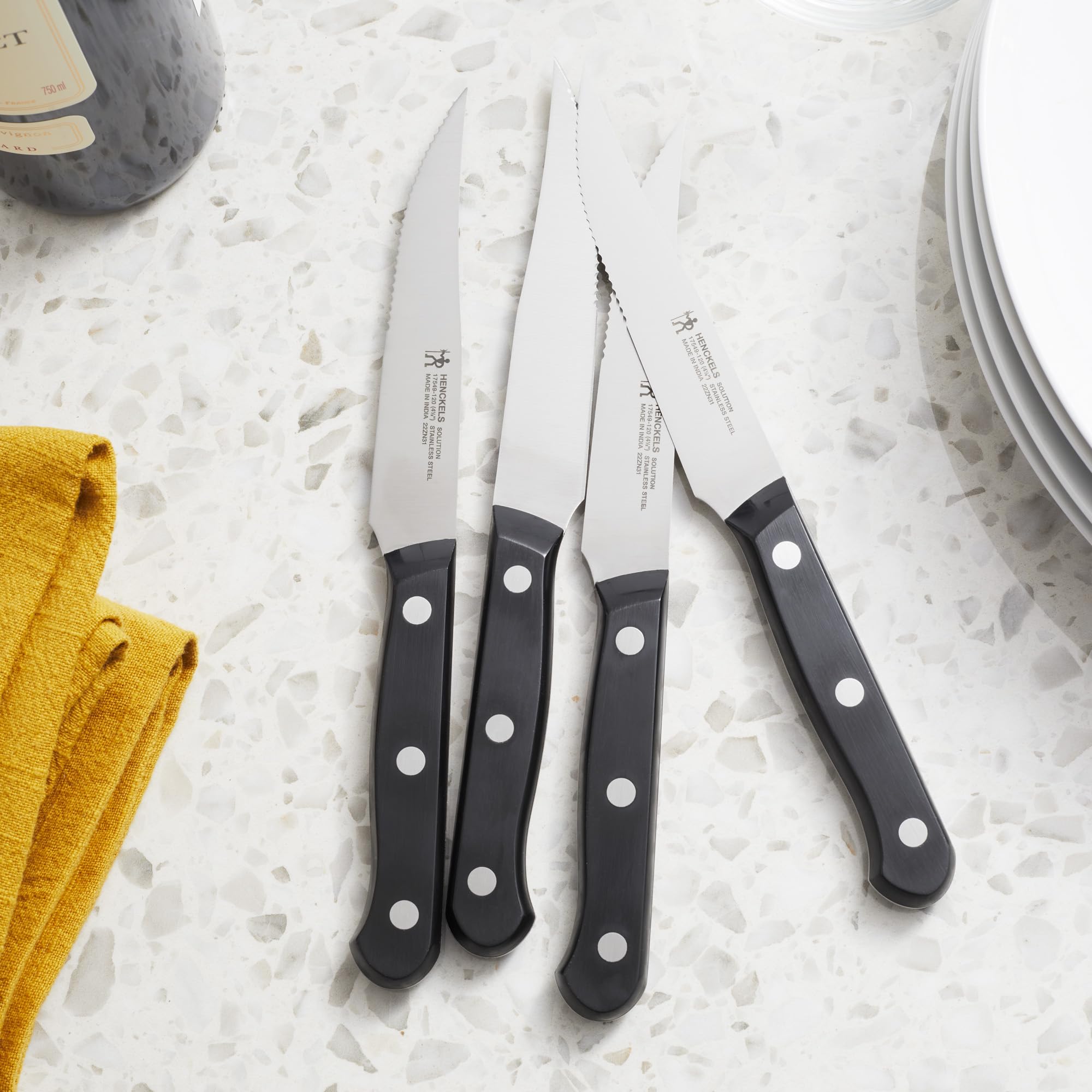 HENCKELS close-up of satin-finished blade edge highlighting precision and reduced food friction