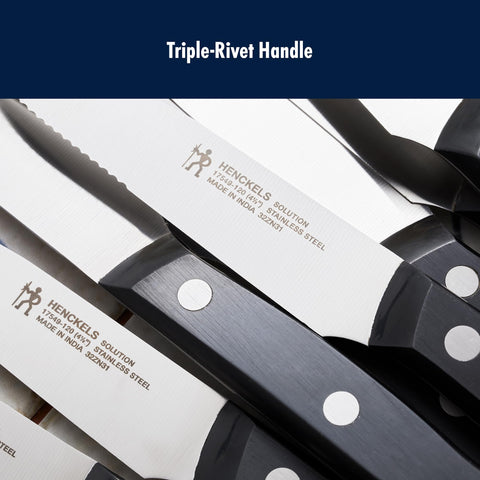 HENCKELS knife held in hand to show lightweight balance and scale