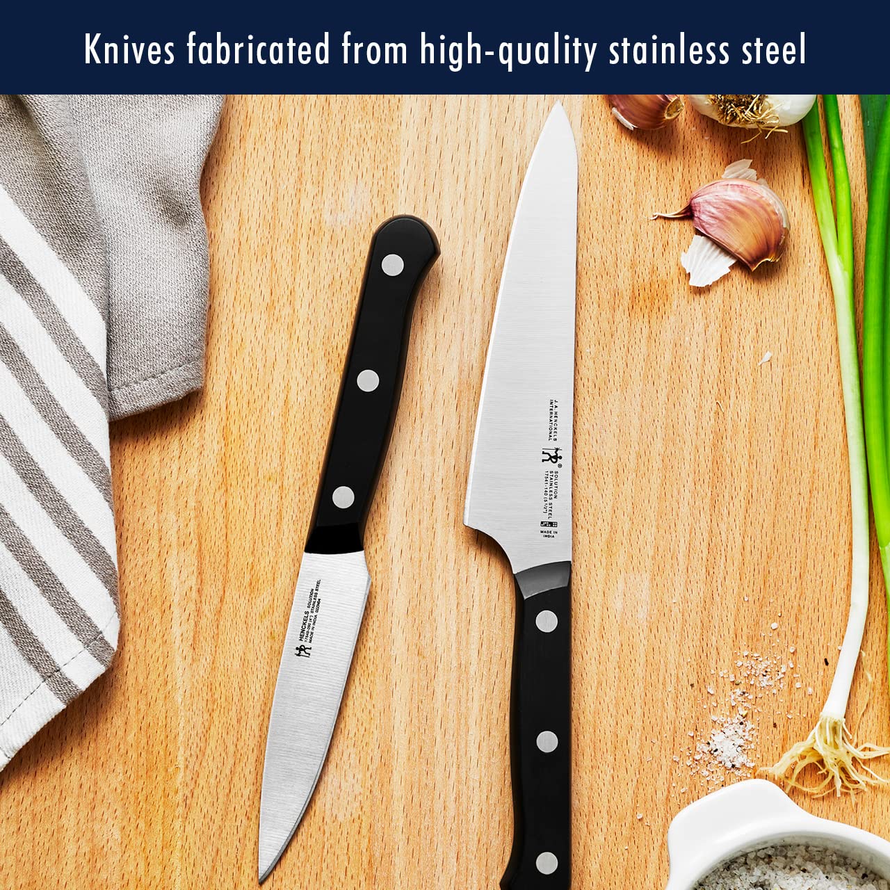 HENCKELS solution santoku hollow-edge detail reducing sticking during slicing