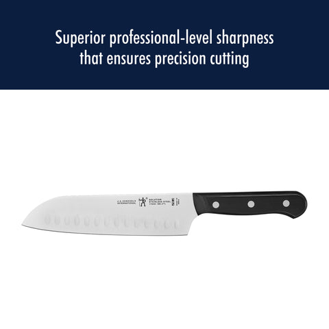 HENCKELS santoku held in hand illustrating lightweight control and balance