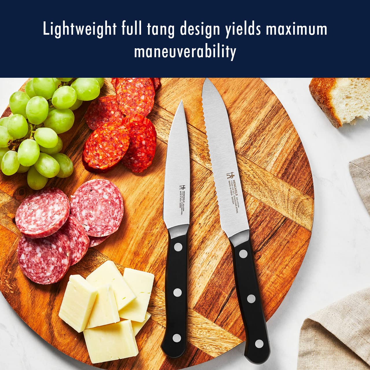 HENCKELS steak knives arranged to show sharpness and even serving utility