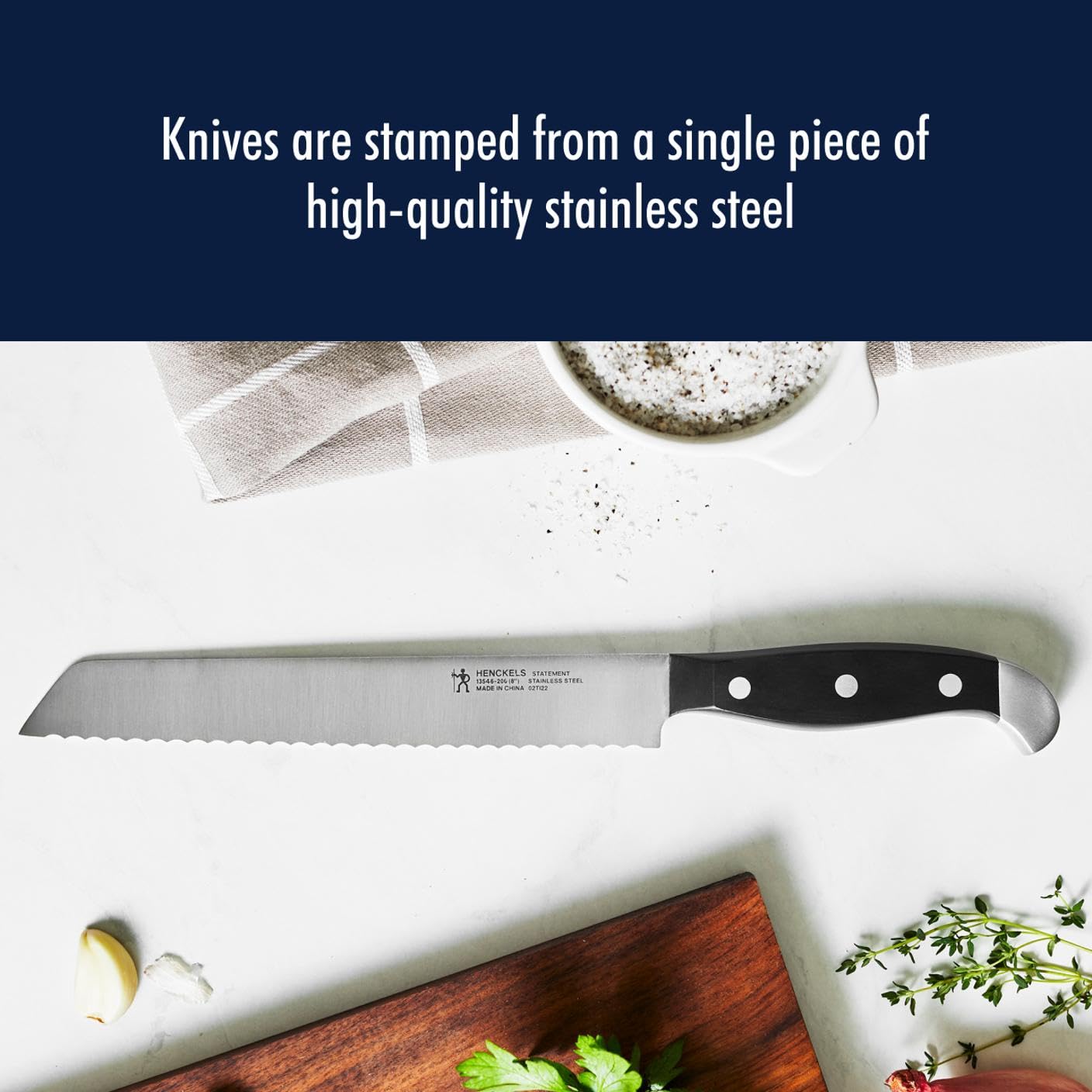 HENCKELS Statement triple-rivet handle detail showing ergonomic curve for comfortable grip