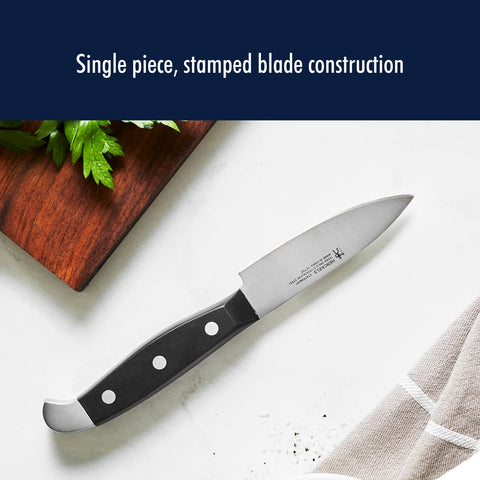HENCKELS set of steak knives displayed with dinner plate for consistent table service
