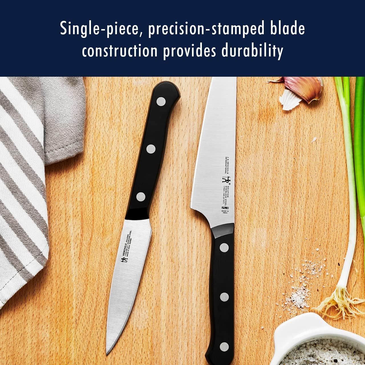 HENCKELS six steak knives arrayed to show uniform edges and table-ready performance