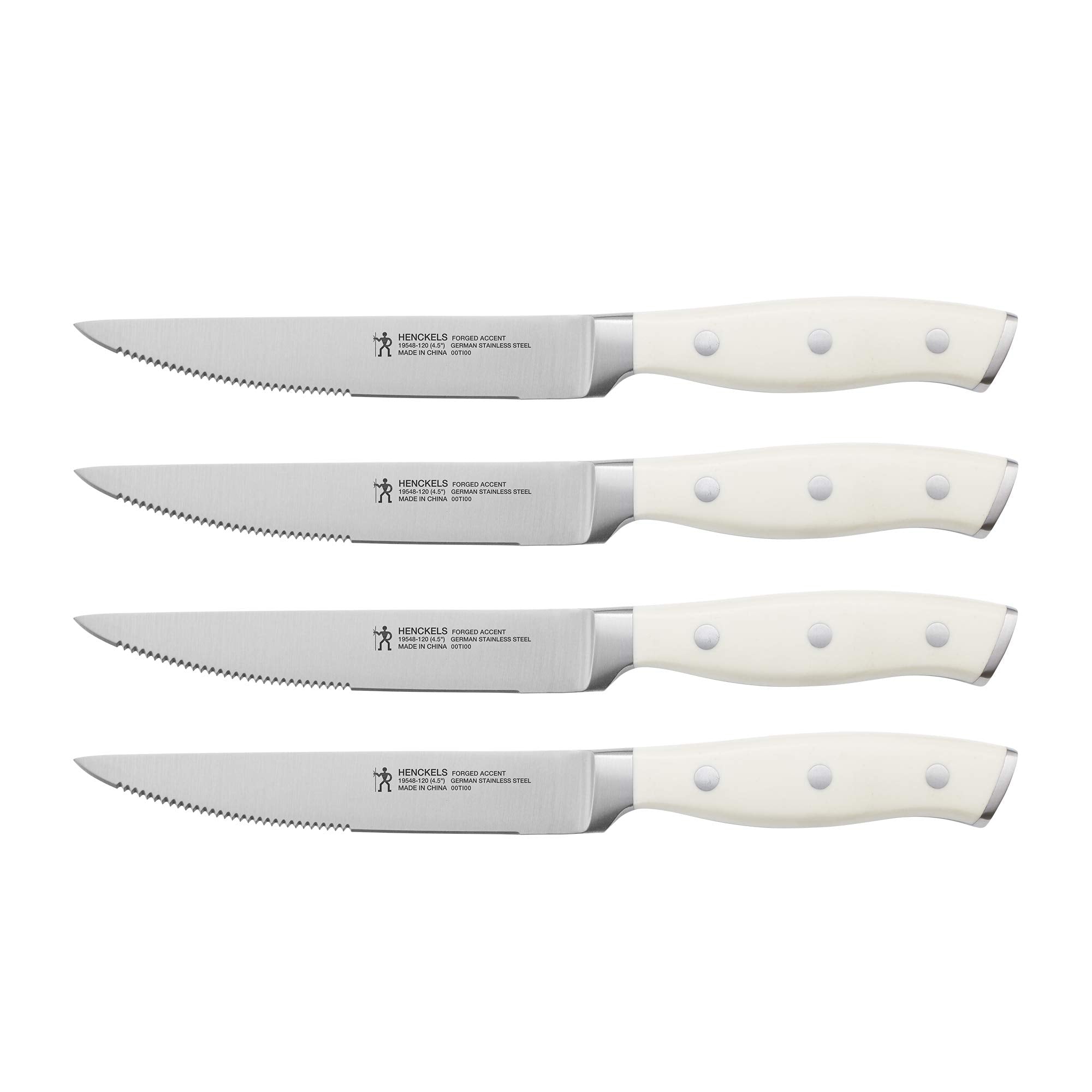 HENCKELS front view of four steak knives showing white handles and blades, elegant table presentation