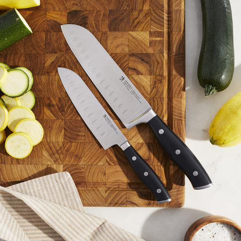 HENCKELS triple-rivet handle angle illustrating ergonomic grip for comfortable prep