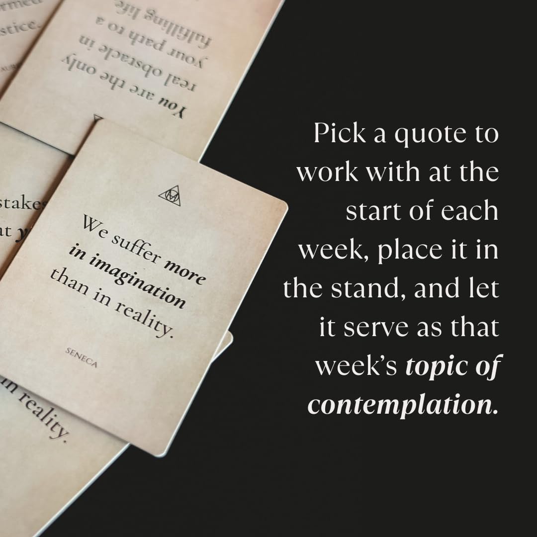 Hermetic Minds card in stand on desk demonstrating daily visibility benefit: constant inspiration