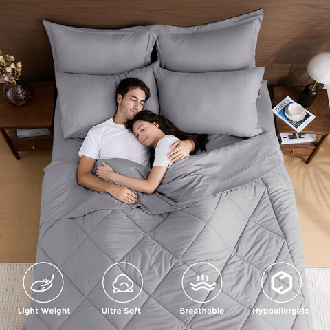 HEVUMYI close-up of comforter fabric showing plush microfiber texture for superior softness