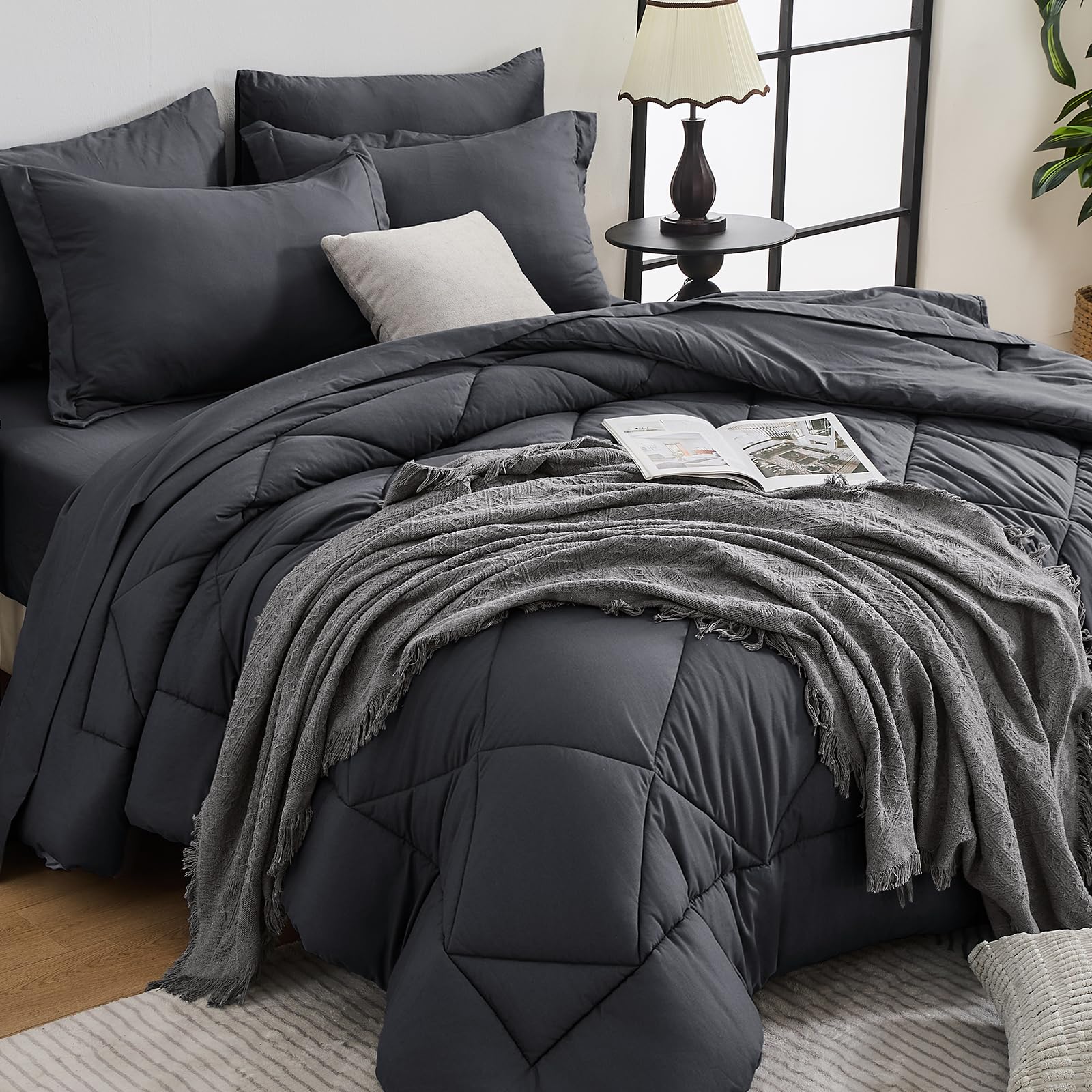 HEVUMYI front view of dark grey comforter showing neat hems and color, enhances bedroom style