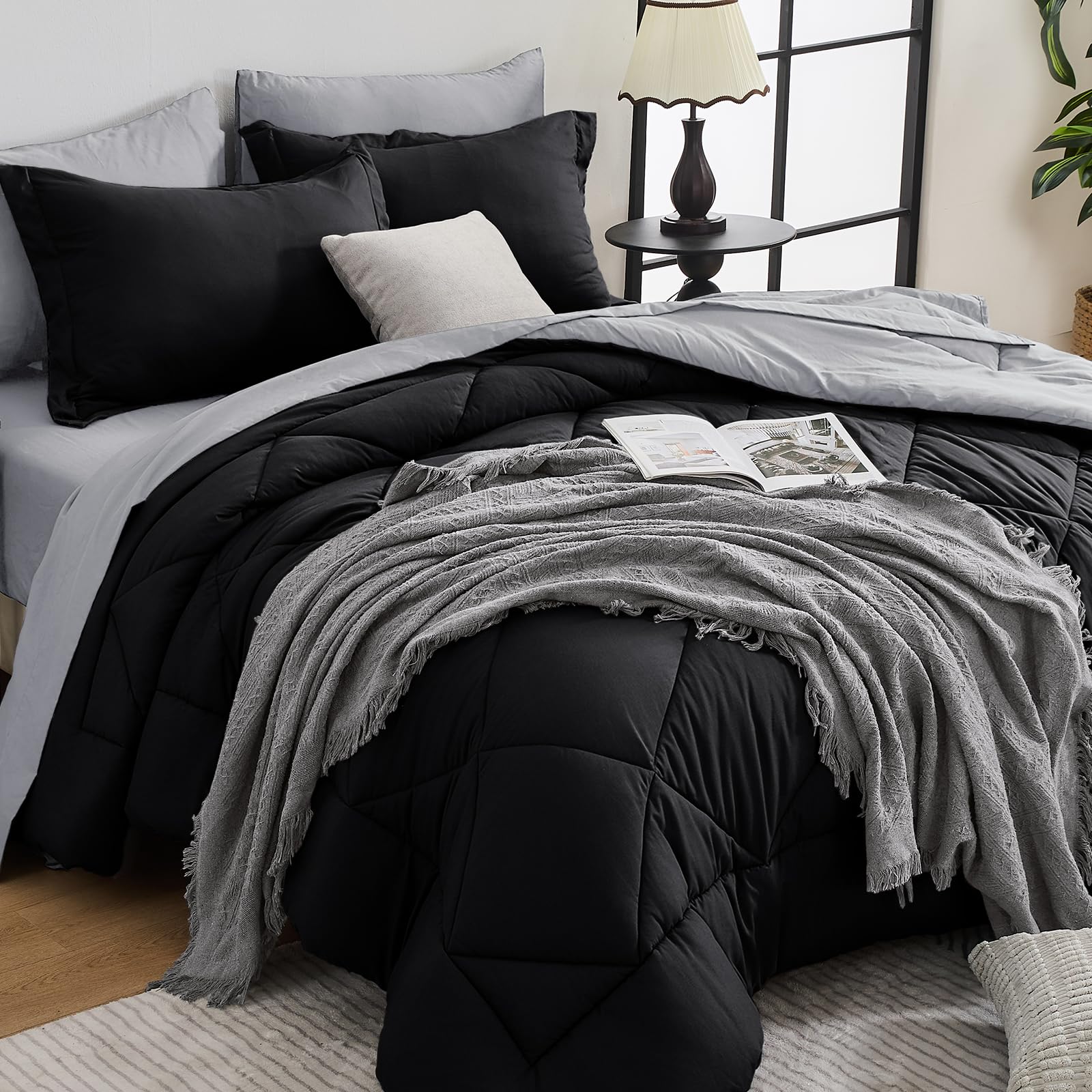 HEVUMYI front view of black and light grey comforter set showing complete bedding ensemble benefits