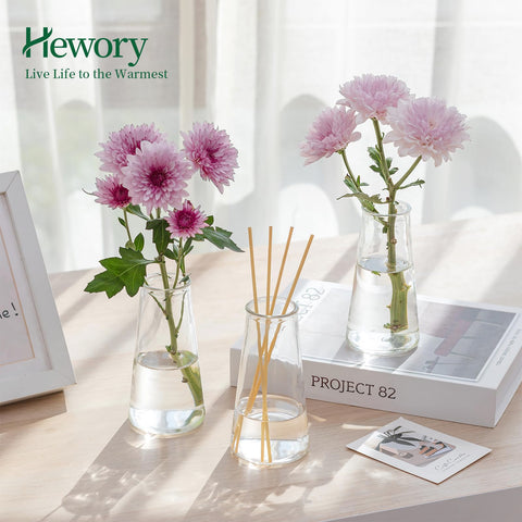 Hewory vase held in hand showing scale and convenient tabletop size