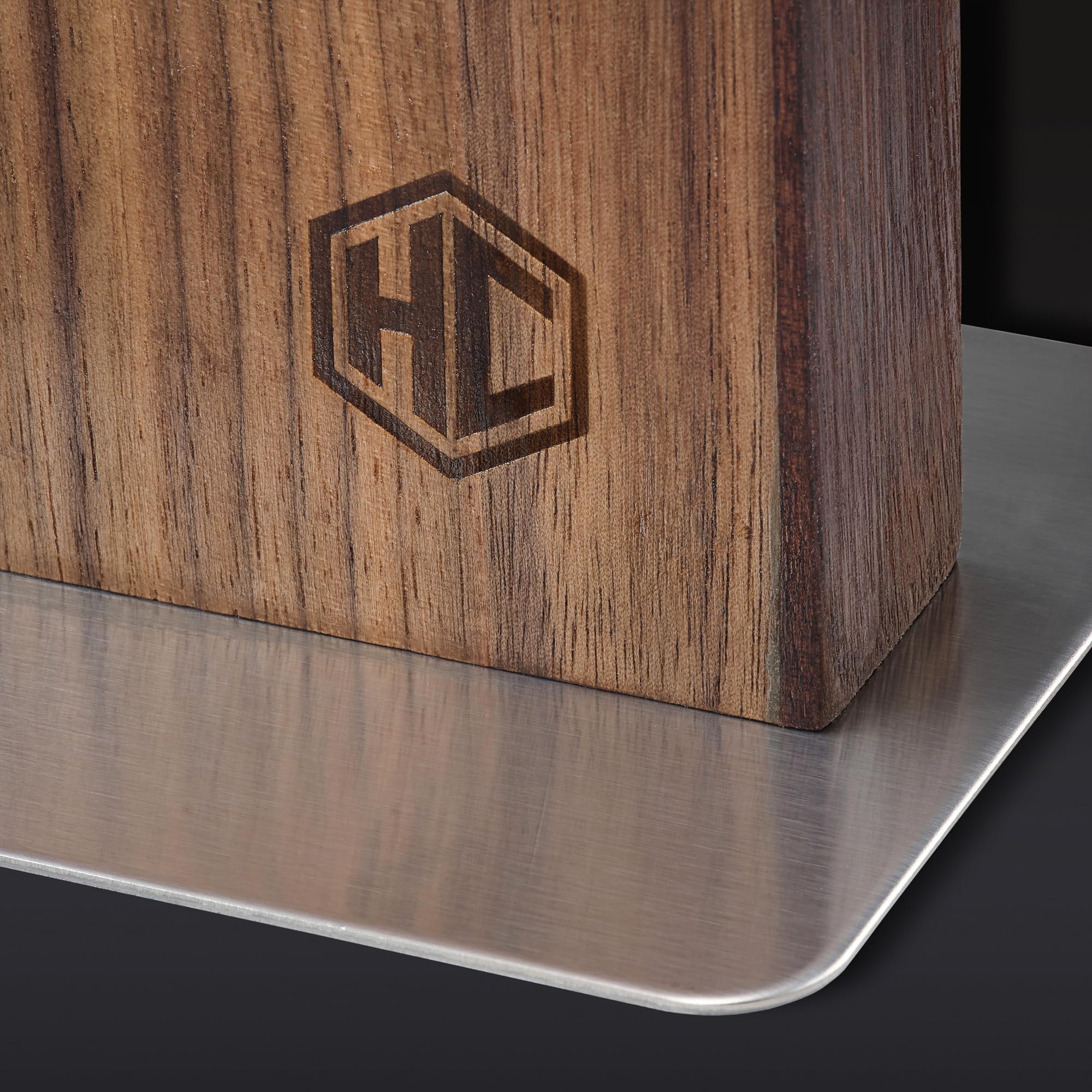HexClad padded stainless-steel base detail showing slip-resistant stability